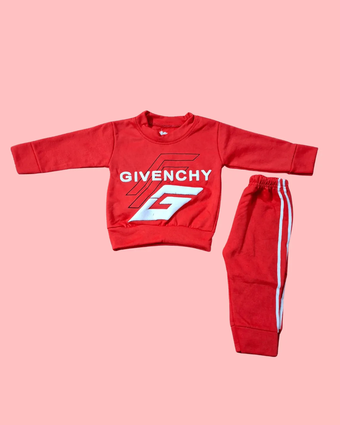 Red Givenchy sweatshirt and pants set on a pink background