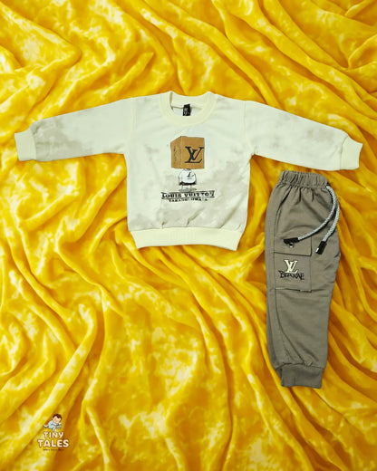 Louis Vuitton sweatshirt and pants on a yellow textured fabric background